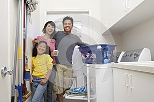 Family Washing Clothes Together