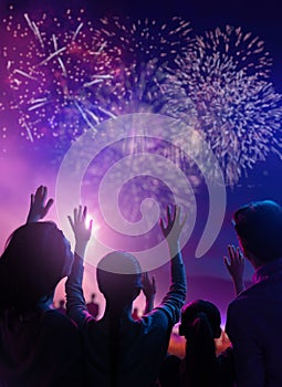 family watching fireworks