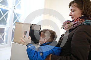 Family watching slides in stereoscope