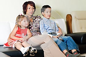 A family watching a tv