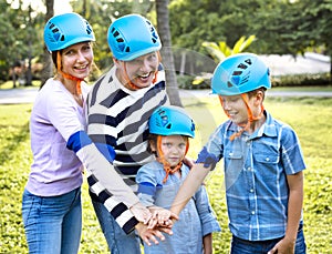 Family wearing protective blue helmets