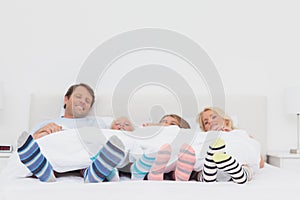 Family wearing stripey socks