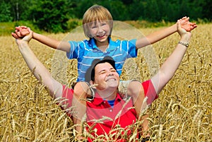 Family in wheat field