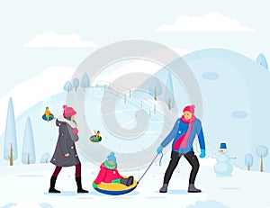 Family winter activity. Family winter vacation with kids riding on snow tubing. Kids having fun enjoy ride