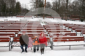 Family on winter bench