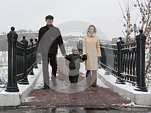 Family on winter bridge