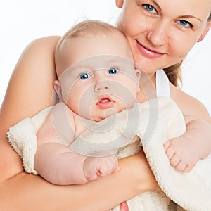Family. Woman with a child. Portrait of beautiful smiling young mother with a baby