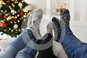 Familyâ€™s legs in warm socks