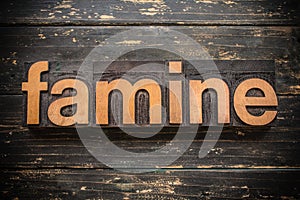 Famine Concept Vintage Wooden Letterpress Type Word photo