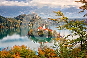 Famous alpine Bled lake Blejsko jezero in Slovenia, amazing autumn landscape. Aerial view