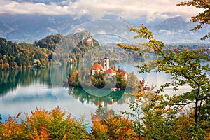 Famous alpine Bled lake Blejsko jezero in Slovenia, amazing autumn landscape. Aerial view photo