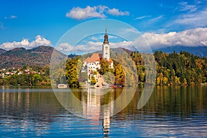 Famous alpine Bled lake Blejsko jezero in Slovenia, amazing autumn landscape, outdoor travel background