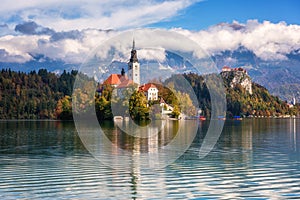 Famous alpine Bled lake Blejsko jezero in Slovenia, amazing autumn landscape, outdoor travel background