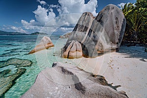 Famous Anse Source d`Argent. Exotic tropical paradise beach on island La Digue in Seychelles. Huge Granite boulders and