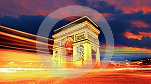 Arc de Triomphe at night in Paris, France