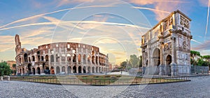 Famous Arch of Constantine and the Coliseum at sunrise, Rome. Italy