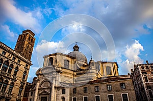 Famous architectural monuments and colorful facades of old medieval buildings close-up n Venice, Italy.