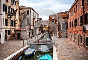 Famous architectural monuments and colorful facades of old medieval buildings close-up n Venice, Italy.