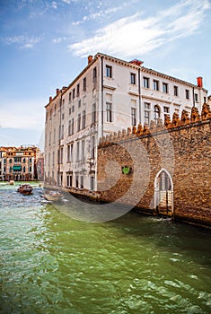 Famous architectural monuments and colorful facades of old medieval buildings close-up n Venice, Italy.