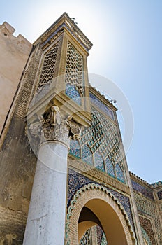 Famous Bab Mansour gate with elaborate decoration, pillars, and arches in arabic city of Meknes, Morocco, North Africa