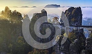 The famous Bastei bridge in Saxon Switzerland during a beautiful autumn sunrise