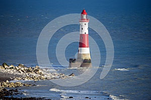 The famous Beachy Head lighthouse and chalk cliffs near Eastbourne in East Sussex, England