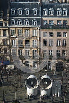 Famous Beaubourg pipes in front of the typical Parisian building