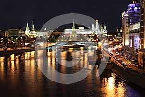 Famous and Beautiful Night View of Moskva river, Big Stone Bridge and Moscow Kremlin Palace with Churches in the summer, Russia