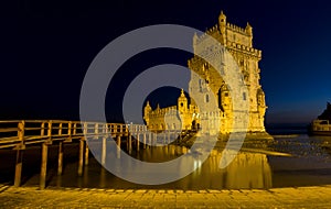 Famous Belem tower after sunset during the blue hour in Lisbon, Portugal.