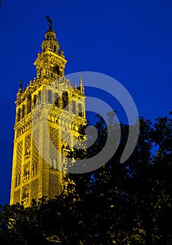 Bell Tower named Giralda in catholic Cathedral of Saint Mary in Seville, Spain