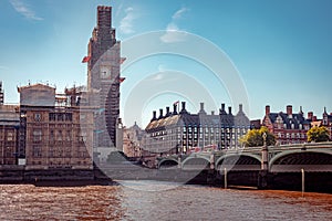 London, England - The famous Big Ben building under renovation covered in scaffolding