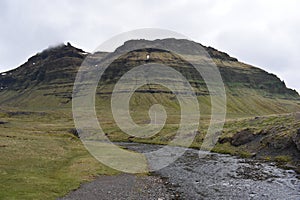 Famous kirkjufell mountain in GrundarfjÃÆÃÂ¶dur in Iceland photo