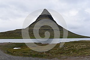 Famous kirkjufell mountain in GrundarfjÃÂ¶dur in Iceland photo