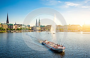 Famous Binnenalster with tourist boat in the Hanseatic City of Hamburg