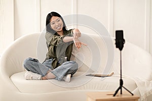 Famous blogger young korean woman streaming from home