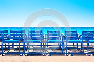 Famous blue chairs on the Promenade des Anglais in Nice, France