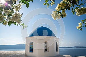 Famous blue dome of an orthodox church in Oia town