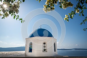 Famous blue dome of an orthodox church in Oia town