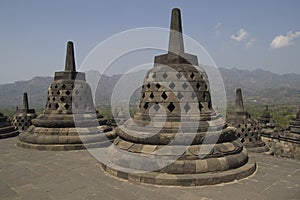 Famous Borobudur temple on a blue sky, Java, Indonesia