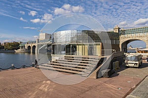 The famous bridge and granite embankment of the Moscow River on a clear sunny day