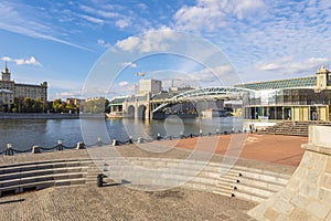 The famous bridge and granite embankment of the Moscow River on a clear sunny day