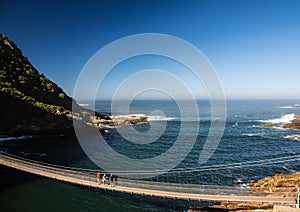 Famous bridge over Storms River Mouth at the Indian Ocean