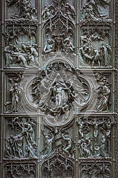 Famous bronze doors of Milan Cathedral, Italy