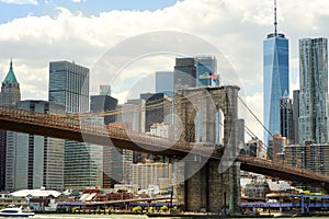 Famous Brooklyn bridge on the background of skyscrapers of Manhattan. Postcard view of New York, USA. United States of America