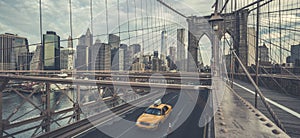 Famous Brooklyn Bridge with cab