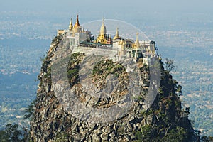 Temple on volcano near Mt. Popa in Myanmar photo