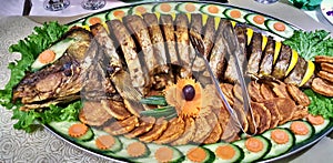 famous carp from lake prespa, macedonia,fish sliced served for eating