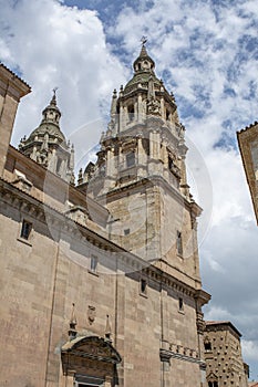 Famous Casa de las Conchas with La Clerecia Church in Salamanca, Spain