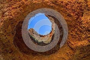 Famous caves in a beach rock formation in the Algarve, Portugal.