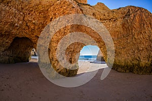 Famous caves in a beach rock formation in Algarve, Portugal.